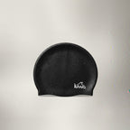 luwa Apex black silicone swim cap with a hydrodynamic shape for reduced drag and comfortable fit.