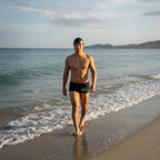 LUWA Apex black silicone swim cap with white logo. Comfortable, durable, and hydrodynamic for training and open water.
