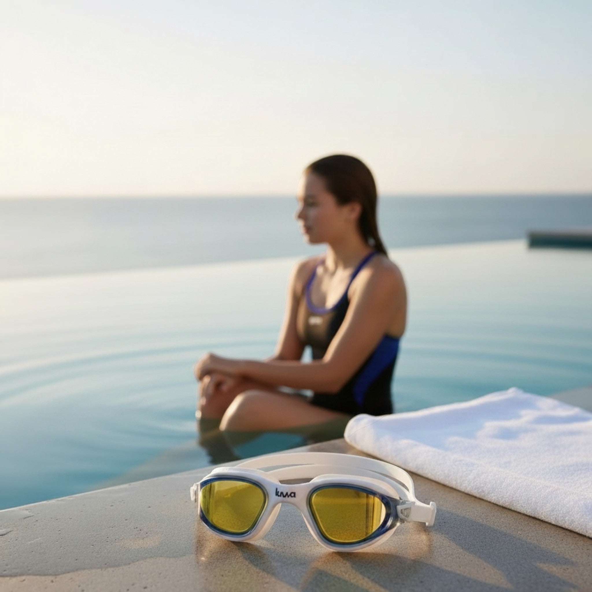 luwa Apex Clear Vision white and blue mirror swimming goggles with yellow lenses, designed for training and comfort.