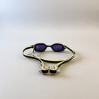 luwa Apex Elite black and gold swim goggles with anti-fog coating and adjustable nose bridge