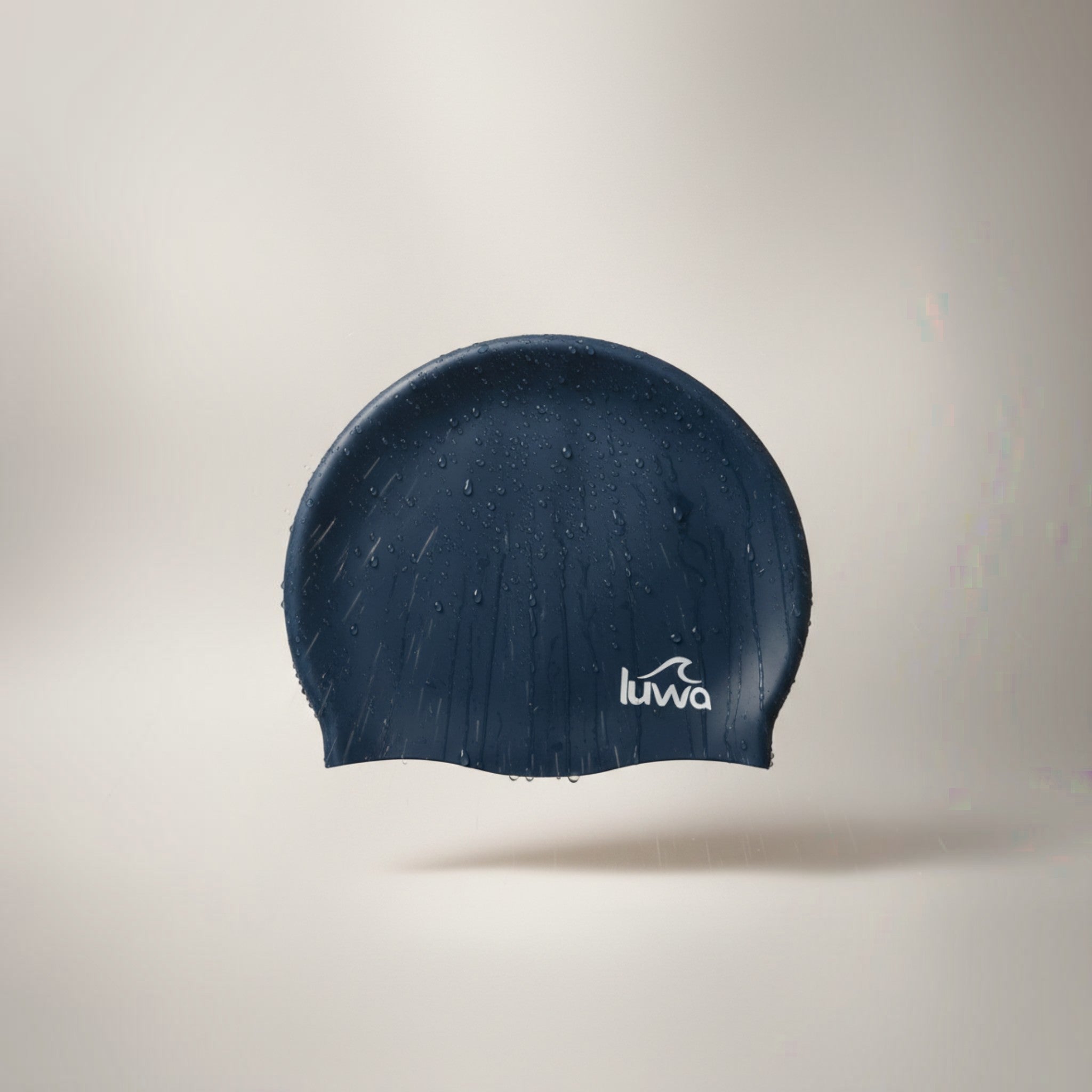 LUWA Apex navy blue silicone swim cap with a hydrodynamic shape for reduced drag and comfortable fit.