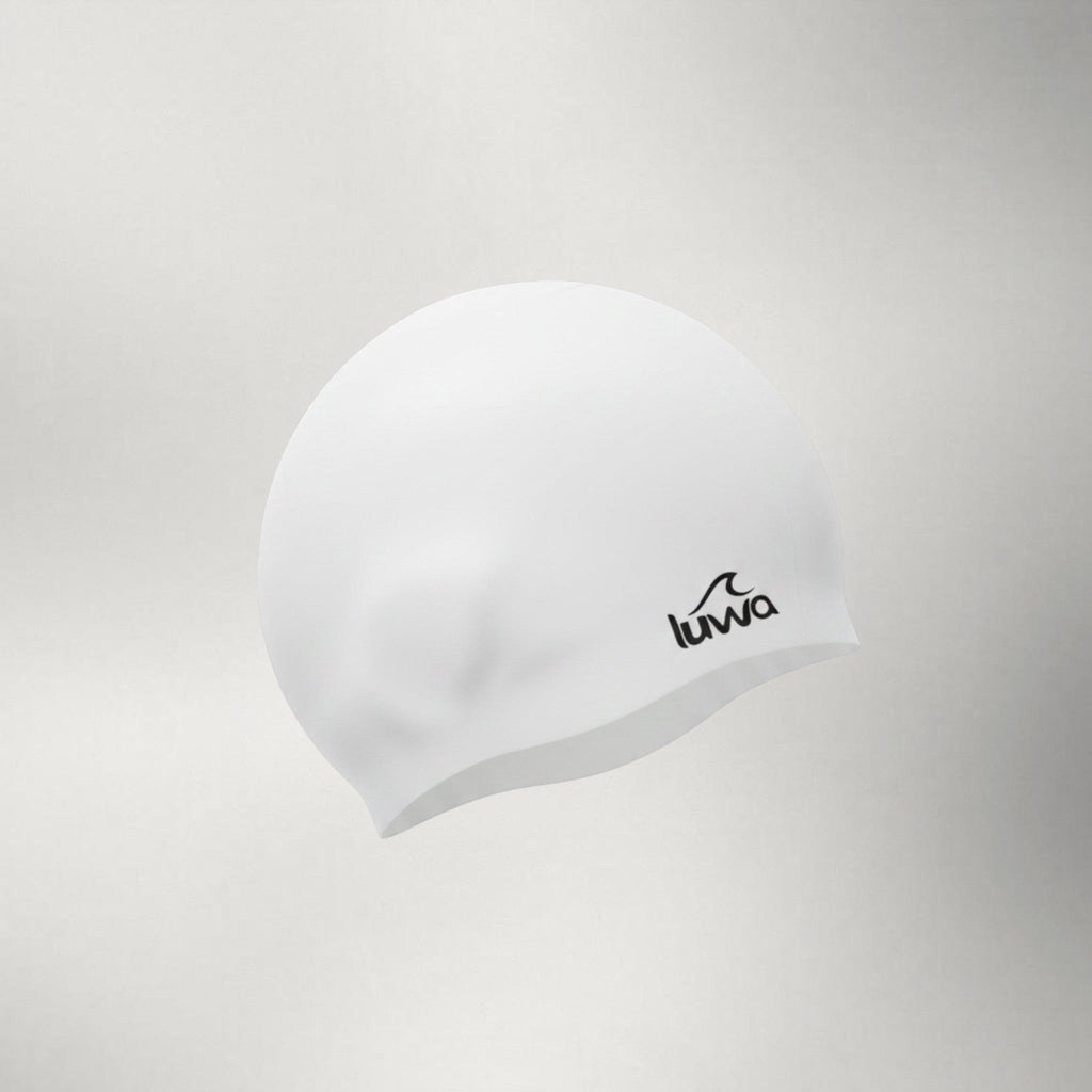 Luwa Apex swim cap in ivory, made of premium silicone. Features a comfortable, hydrodynamic design for reduced drag and a secure fit.