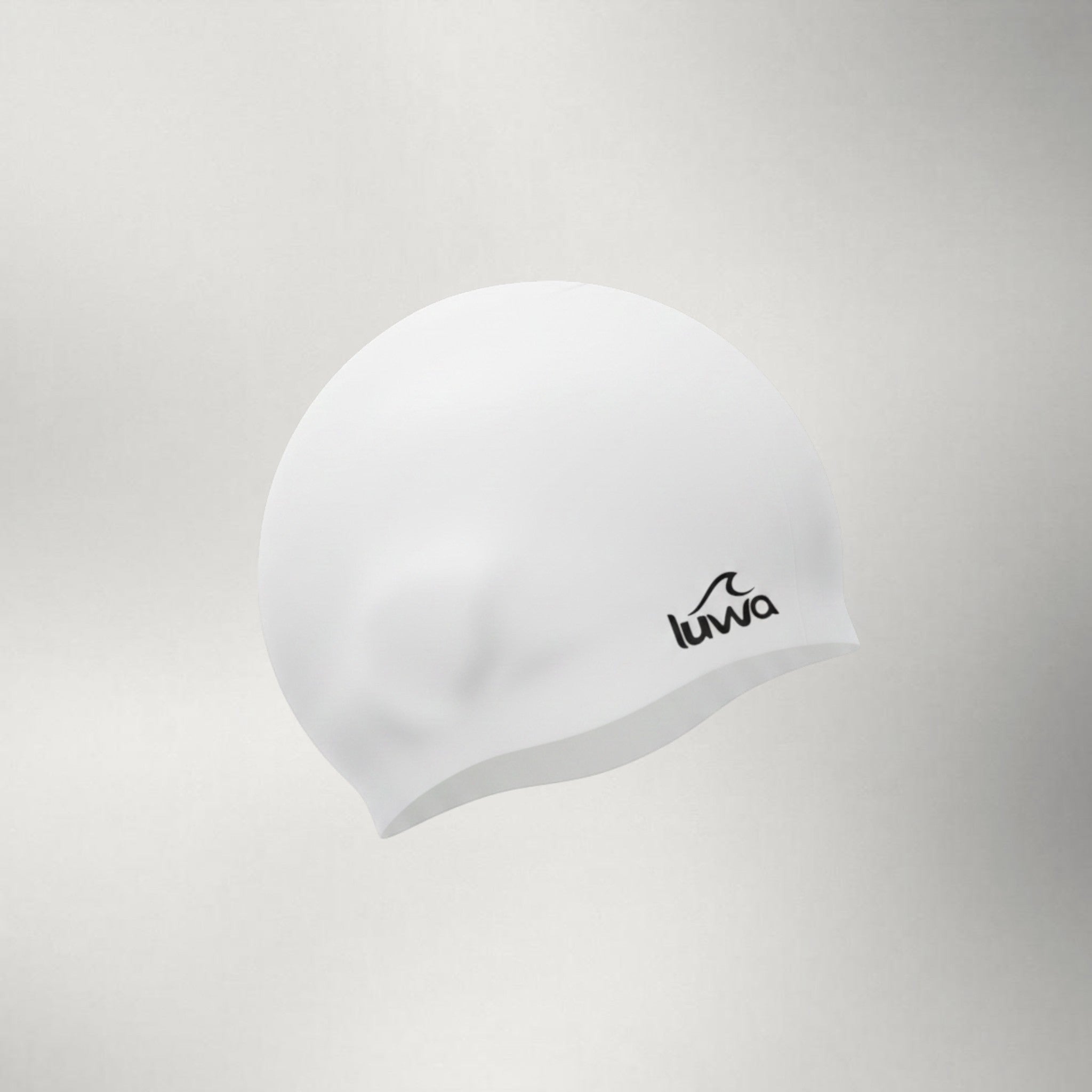 Luwa Apex swim cap in ivory, made of premium silicone. Features a comfortable, hydrodynamic design for reduced drag and a secure fit.