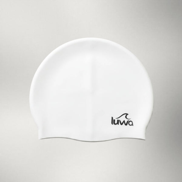 Luwa Apex swim cap in ivory, made from premium silicone for comfort and durability. Features a hydrodynamic shape.