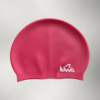 luwa Apex swim cap in bright pink silicone with white logo. Comfortable, durable, and hydrodynamic for training.