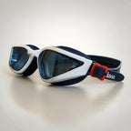 luwa Apex Vision Pro blue and white swimming goggles with anti-fog coating and adjustable nose bridge.
