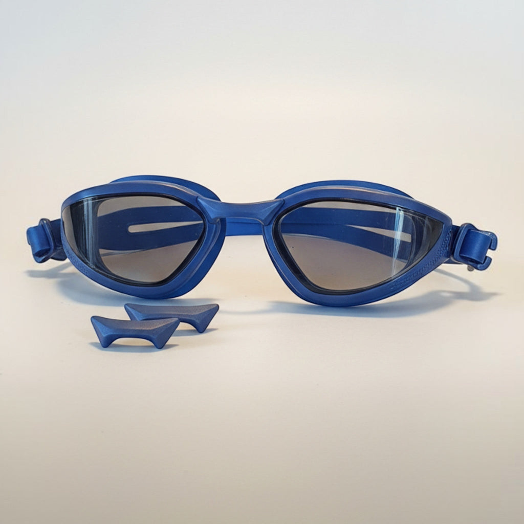 luwa Apex Vision Pro navy blue training goggles with interchangeable nose bridges and anti-fog coating.