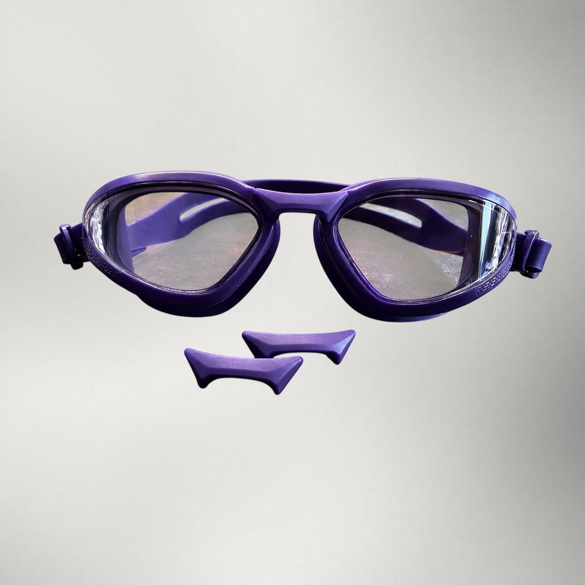 luwa Apex Vision Pro purple clear training goggles with interchangeable nose bridges for a secure, comfortable fit.
