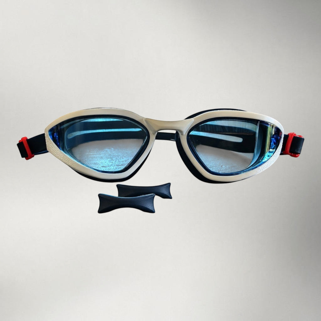 luwa Apex Vision Pro blue and white swimming goggles with adjustable nose bridges. Anti-fog lenses.