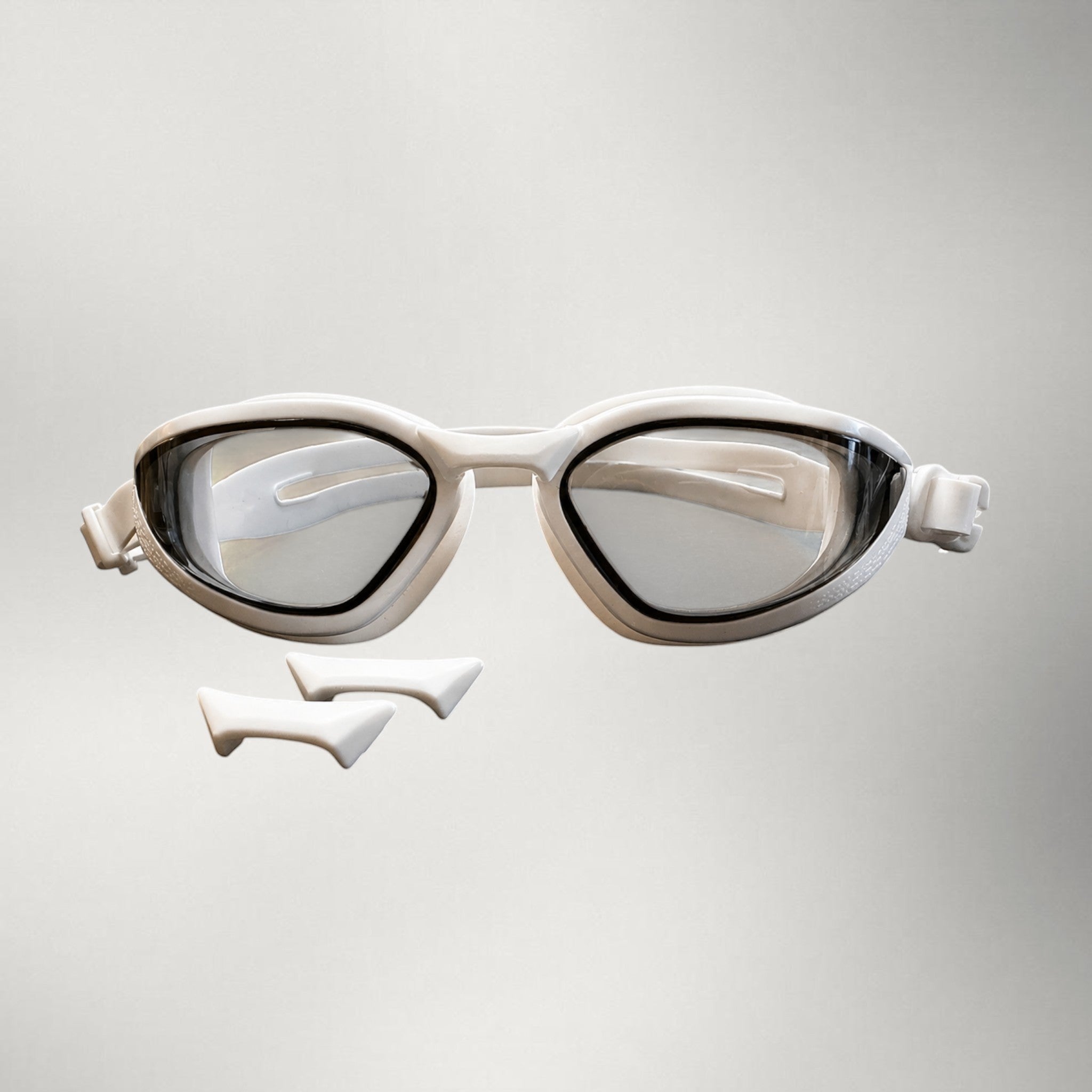 luwa Apex Vision Pro white gray training goggles with anti-fog coating and 3 interchangeable nose bridges for a secure fit.