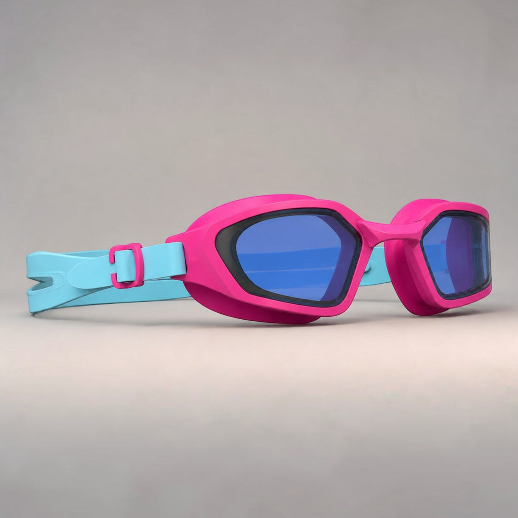luwa Coral Flash swim goggles with pink frame, blue lenses, and light blue strap. Features anti-fog and anti-slip.