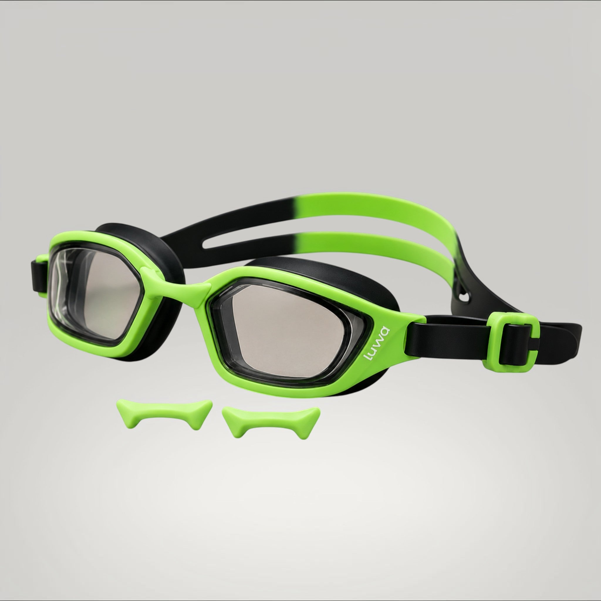 luwa Coral Flash swim goggles in black and neon green with anti-fog PC lens and adjustable nose bridges.